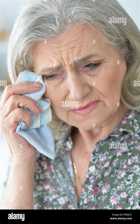 Stressed Senior Woman Crying Stock Photo Alamy