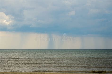Rain Clouds And Rain Over The Sea Stock Photo Image Of Cloudscape