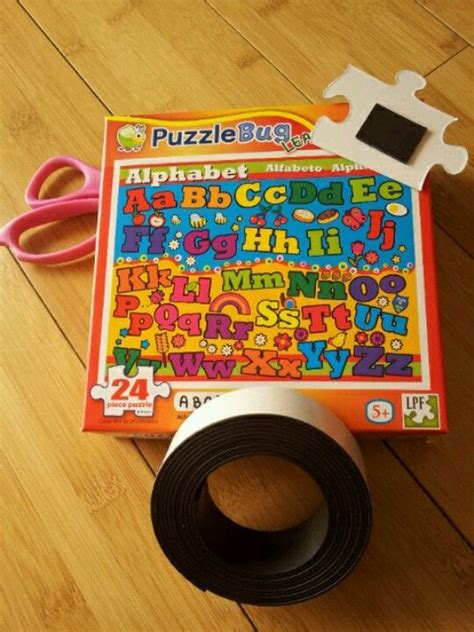 Maybe you would like to learn more about one of these? Dollar store puzzle + magnets + one old cookie sheet= a ...