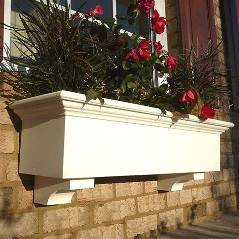 Add a vinyl white window box to match your porch railing, or go with black for bold contrast. 48" traditional PVC window boxes $155 8"hx10"w without ...