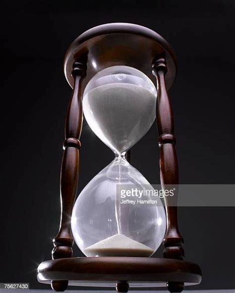 Empty Hourglass On Black Photos And Premium High Res Pictures Getty