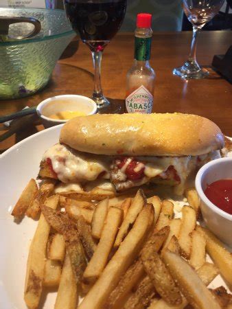 6710 roosevelt ave, middletown, oh 45005. Eggplant parmigiana sandwich with fries and salad for ...