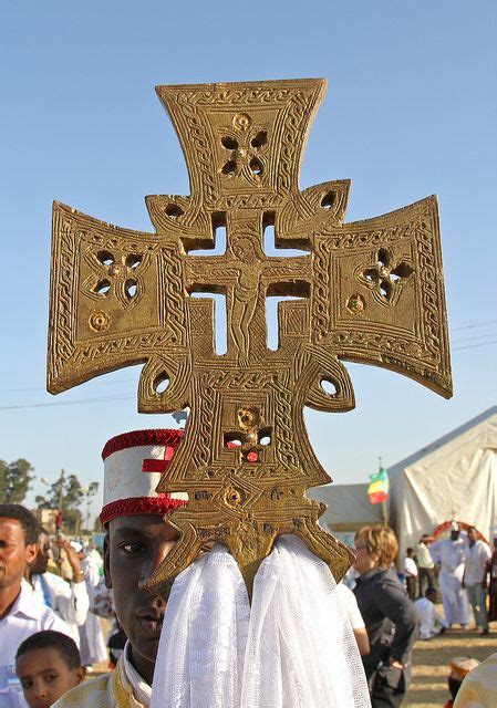 Ethiopian Orthodox Priest Holding A Cross During The Colorful Timkat