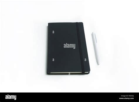 Notebook And White Pen Isolated On White Background Stock Photo Alamy