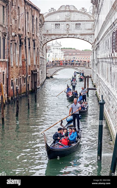 Gondolas Under Bridge Sighs In Venice Hi Res Stock Photography And
