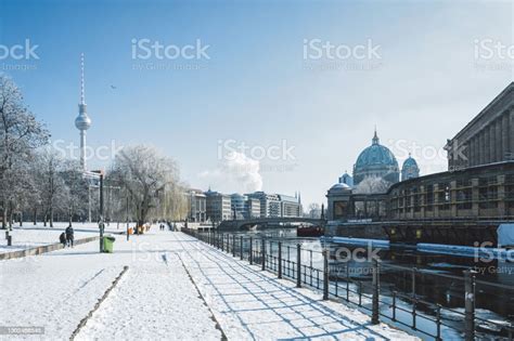 Snowy Berlin Cityscape With Tvtower And Cathedral In The Winter Sun