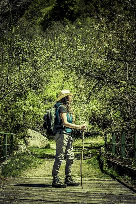 Woman Hiking Through Beautiful Natural Landscape Stock Photo Image Of