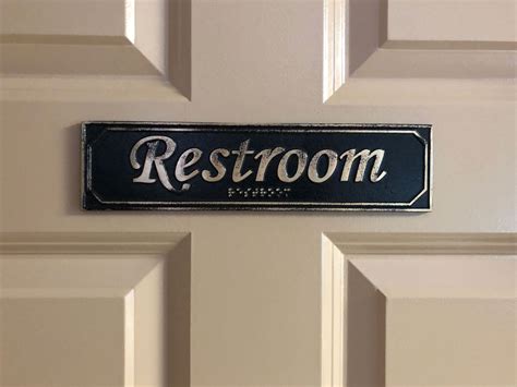 Brass Antiqued Restroom Door Sign With Braille 9 5 8 X 2 3 8 Custom Metal Signs Kcastings Inc