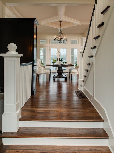 Coveted by many, natural hardwood floors will always be a selling point, but they aren't ideal for some homeowners and in certain situations. Coastal Home with Traditional Interiors - Home Bunch ...