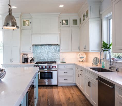 Quartz countertops come with a variety of advantages. Coastal White Kitchen with Turquoise Island - Home Bunch ...
