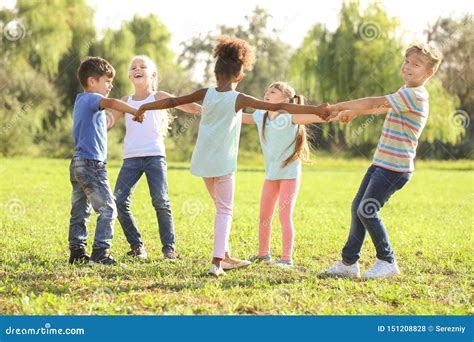 Cute Little Children Playing Outdoors Stock Photo Image Of Leisure