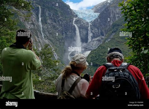 Tourists Photographing The Ventisquero Colgante Hanging Glacier