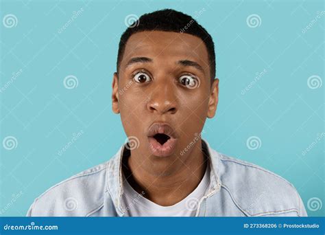 Portrait Of Shocked Surprised Funny Silly Millennial Black Guy With