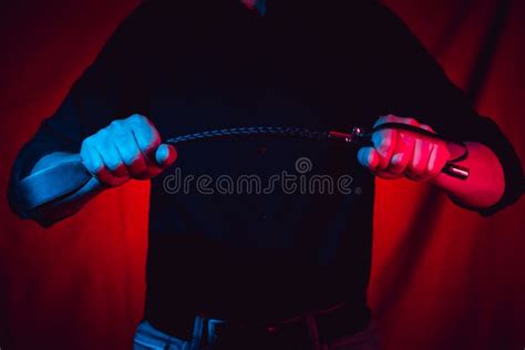 Handsome Guy With A Bdsm Whip In His Hands Stock Image Image Of