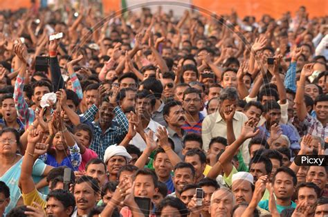 Image Of Crowd Of Young Indian Cheering And Recording With Smartphones
