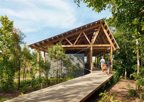 Pine Pavilions Form Marine Education Center In Mississippi By Lake