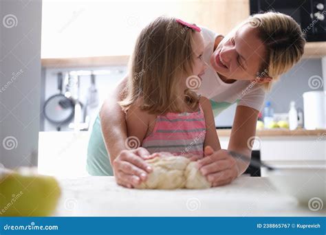 Mom And Daughter Knead Dough Together In The Kitchen Stock Image Image Of Dishes Culinary