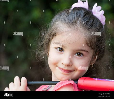 Playful Little Girl Smiling Stock Photo Alamy