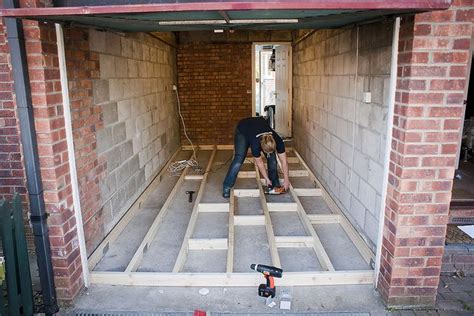 It could be used as a spare bedroom or to give someone within your family larger living space. Garage Conversion - securing floor joists in 2020 | Garage ...