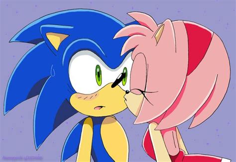 a amy kissing sonic on the cheek i can t handle this much cuteness sonic the hedgehog