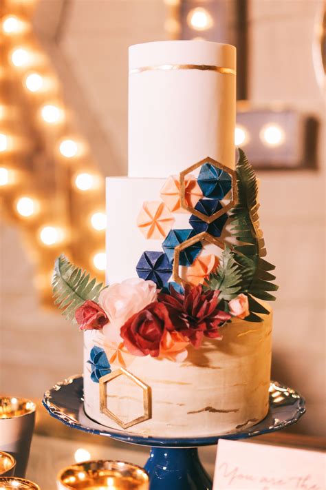 19 sweet doughnut wedding cakes. Keeping with the stitching theme, the ivory wedding cake showcased a cascade of hexago ...