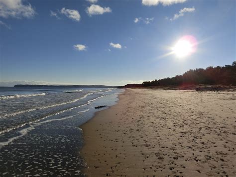 Безплатна снимка плаж пейзаж крайбрежие пясък океан хоризонт облак слънце изгрев