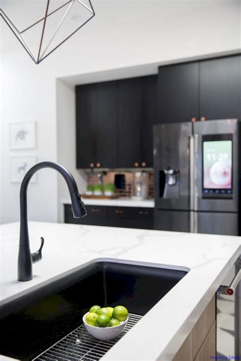 Epoxy is a bonding agent that helps certain paints adhere better to different sink materials and protects the material underneath. Luxurious Black and White Kitchen Design Ideas 059 ...