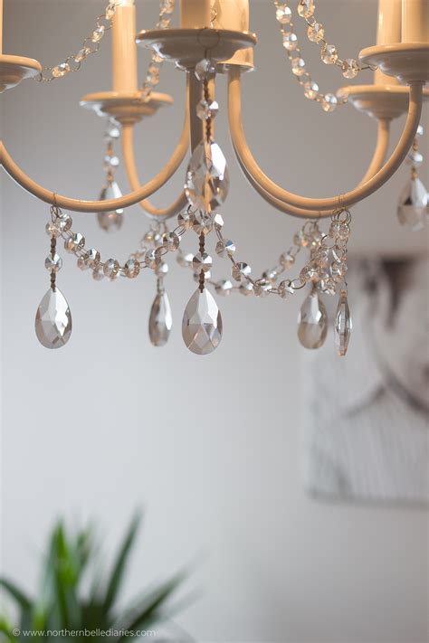 Check out this delicate and minimalistic diy chandelier! DIY Crystal Chandelier (easy tutorial)