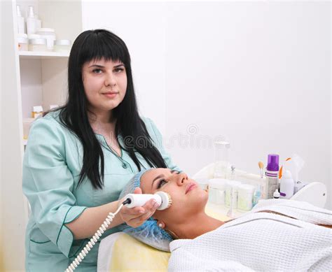 Hardware Cosmetology Cleaning The Skin With A Brush Stock Image