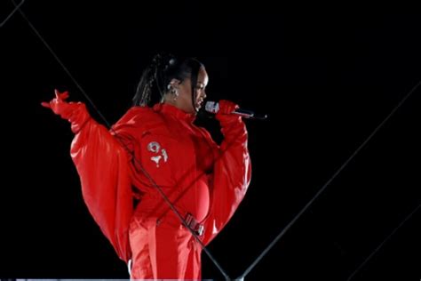 Super Bowl Lvii Rihanna Shows Baby Bump On Her Incredible Half Time