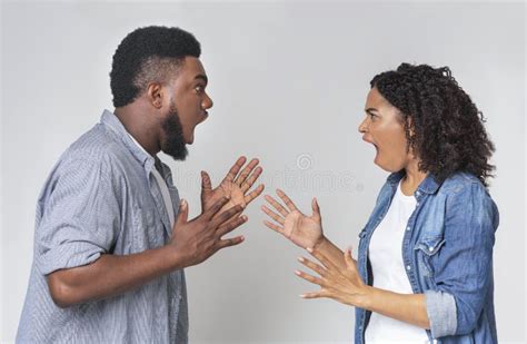 Couple Arguing Angry Black Man And Woman Shouting At Each Other Stock