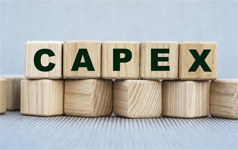 Capex Word On Wooden Cubes On A Beautiful Gray Background Stock Image