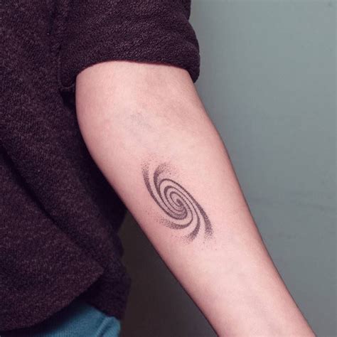 Hand Poked Spiral Galaxy Tattoo On The Left Inner Forearm Tatuaje