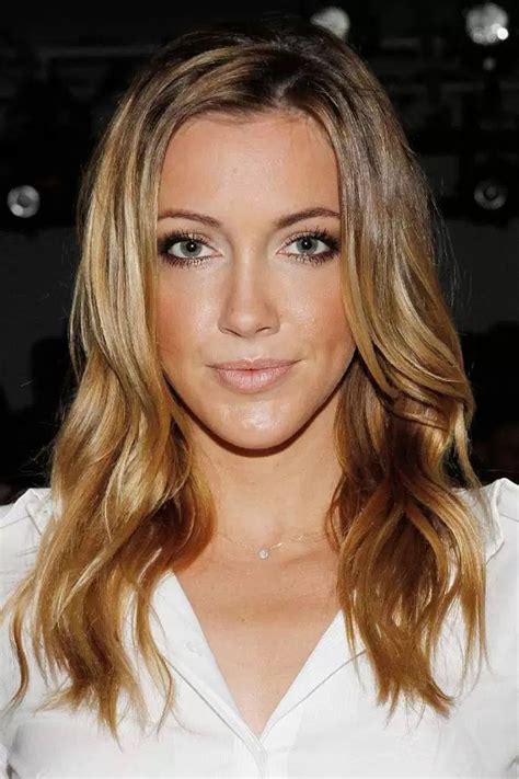 katie cassidy brown gold v neck long hair styles eyes makeup beauty black starling