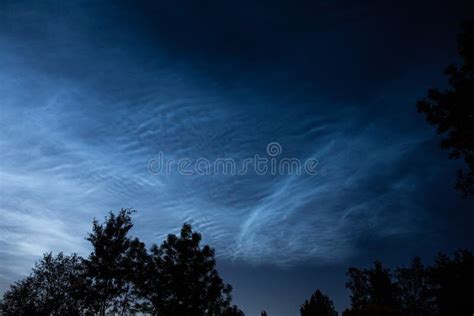 Noctilucent Clouds Or Night Shining Clouds In Midnight Summer Sky