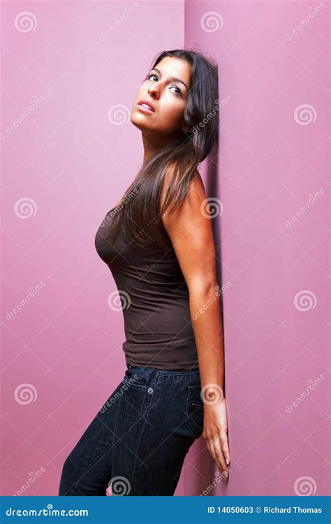 Woman Leaning Against A Wall Stock Photos Image