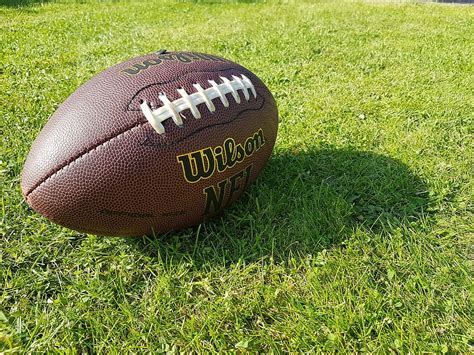 Brown Wilson Football Green Grasses Daytime American Football