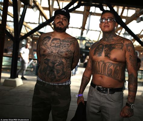 Tattoo Devotees Showcase Beautiful Designs At East London S Tobacco Dock Daily Mail Online