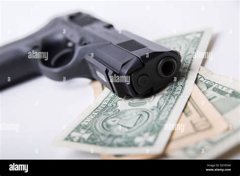 Guns And Money Stock Photo Alamy