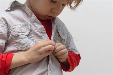 Childhood Independence Concept Little Boy Buttoning On Shirt