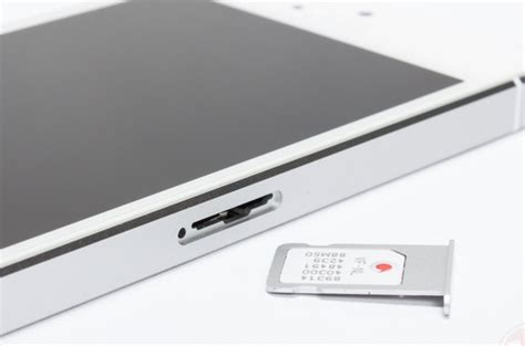 Maybe you would like to learn more about one of these? iPhone 6 will receive a magnetic slot for SIM-card