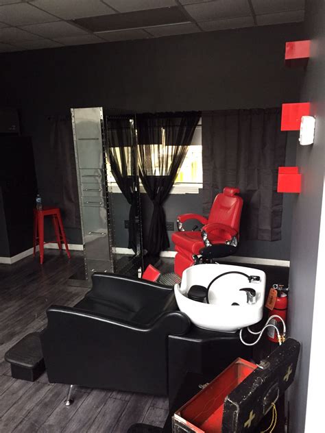 Light green walls and a red vintage sofa. Black, white, grey and red salon design. Small space ...