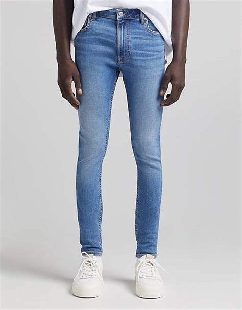 Bershka Super Skinny Jeans In Mid Blue Asos
