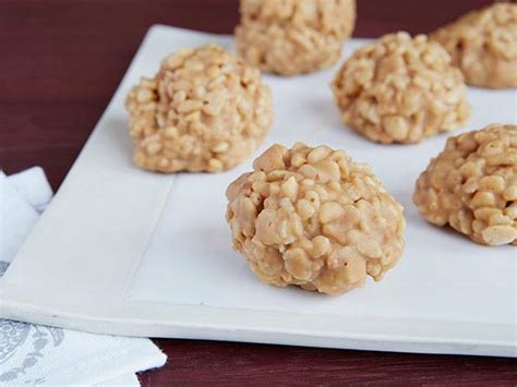 With a tablespoon, spoon the peanut butter and the strawberry jam all over the cookie dough. "Miss" Mickey's Peanut Butter Balls Recipe | Trisha ...