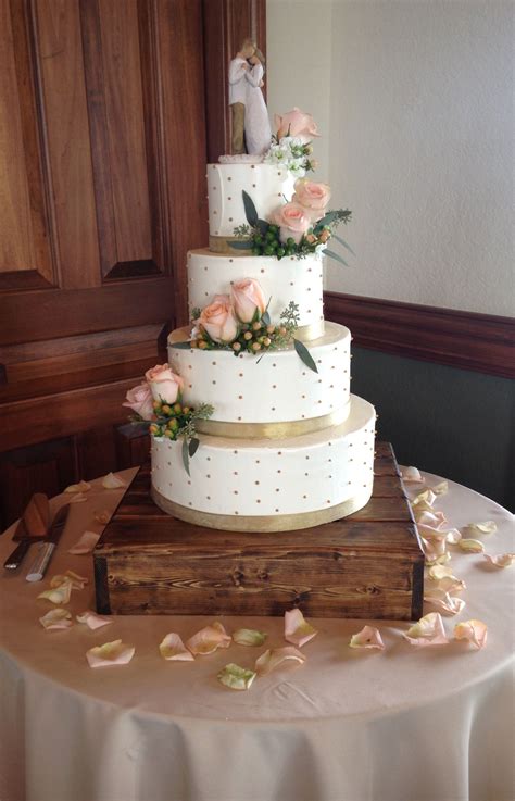 The dimensions are inner dimensions. Simple buttercream wedding cake accented the gold ribbon ...