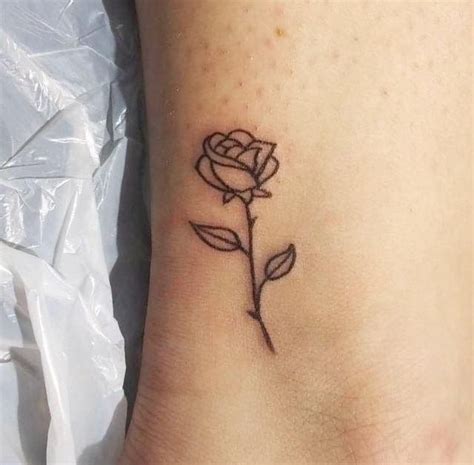 A cute alternative to the standard coloring is a yellow rose tattoo. Cute little rose tattoo. Dainty and sweet. Who doesnt like ...