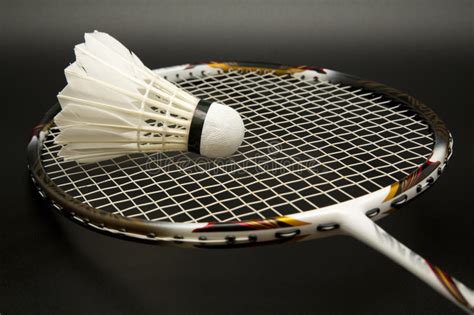 Sometimes beginners spend much on racket, thinking they can play well if their materials are expensive. Badminton Racket And Shuttlecock Stock Photo - Image of ...