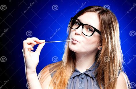 Portrait Of Strict Young Woman With Nerd Glasses And Chewing Gum Stock Image Image Of Grimace
