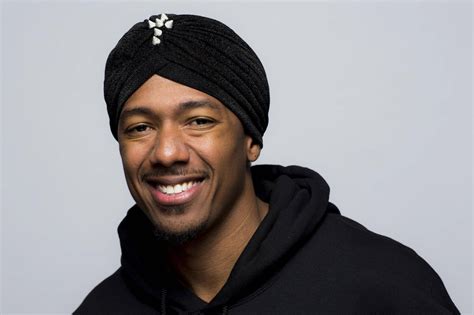 Download Nick Cannon Posing With Black Turban Wallpaper