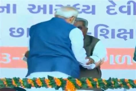 Watch On Stage Pm Narendra Modi Touches Former Cm Keshubhai Patels